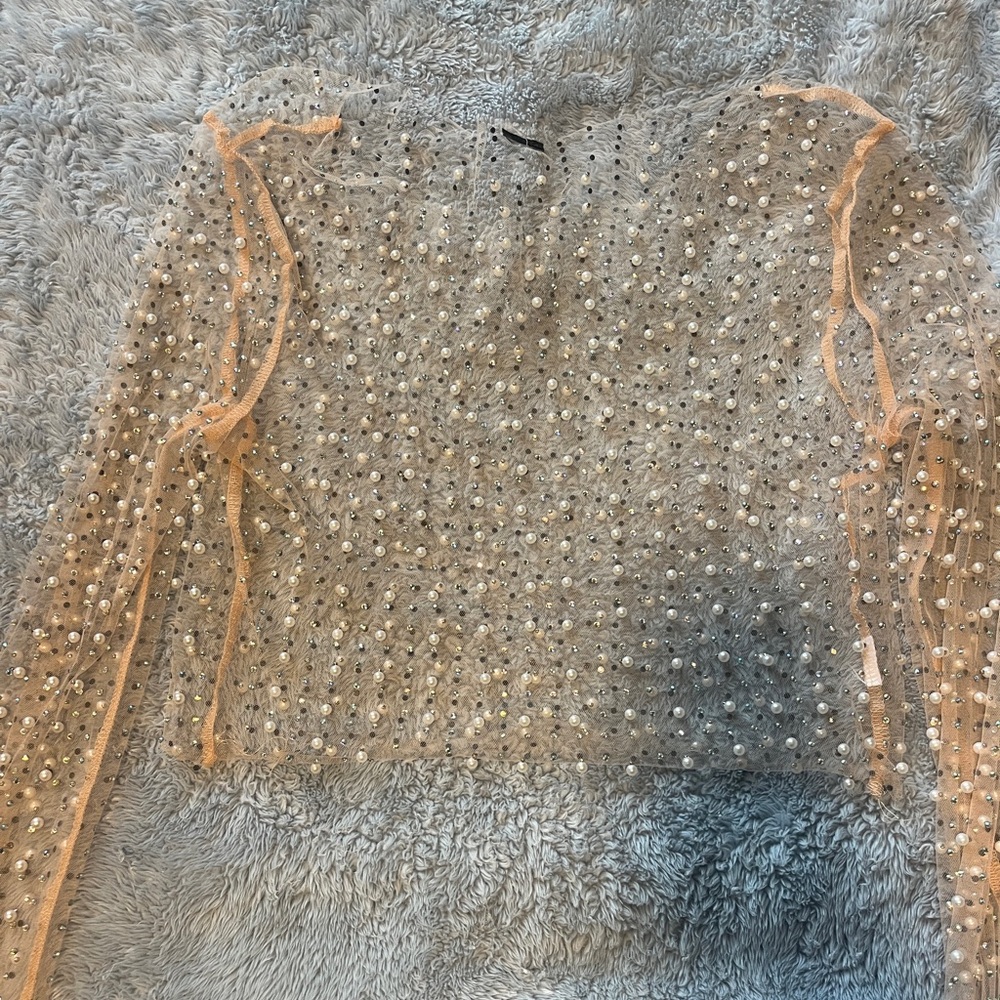 Sheer pearl top